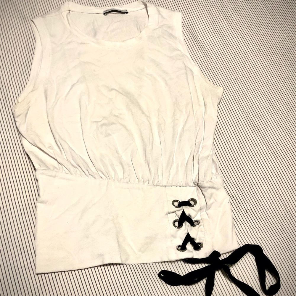 White sleeveless top